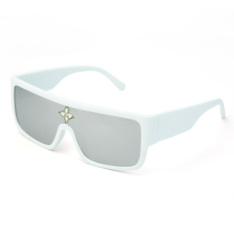 Damen Sonnenbrille im futuristischen Oversized-Design mit funkelndem Dekor Karnz