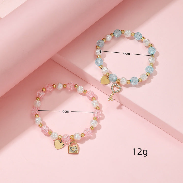 Verspieltes Armbandset mit Herz- und Schlüsseldesign Karnz
