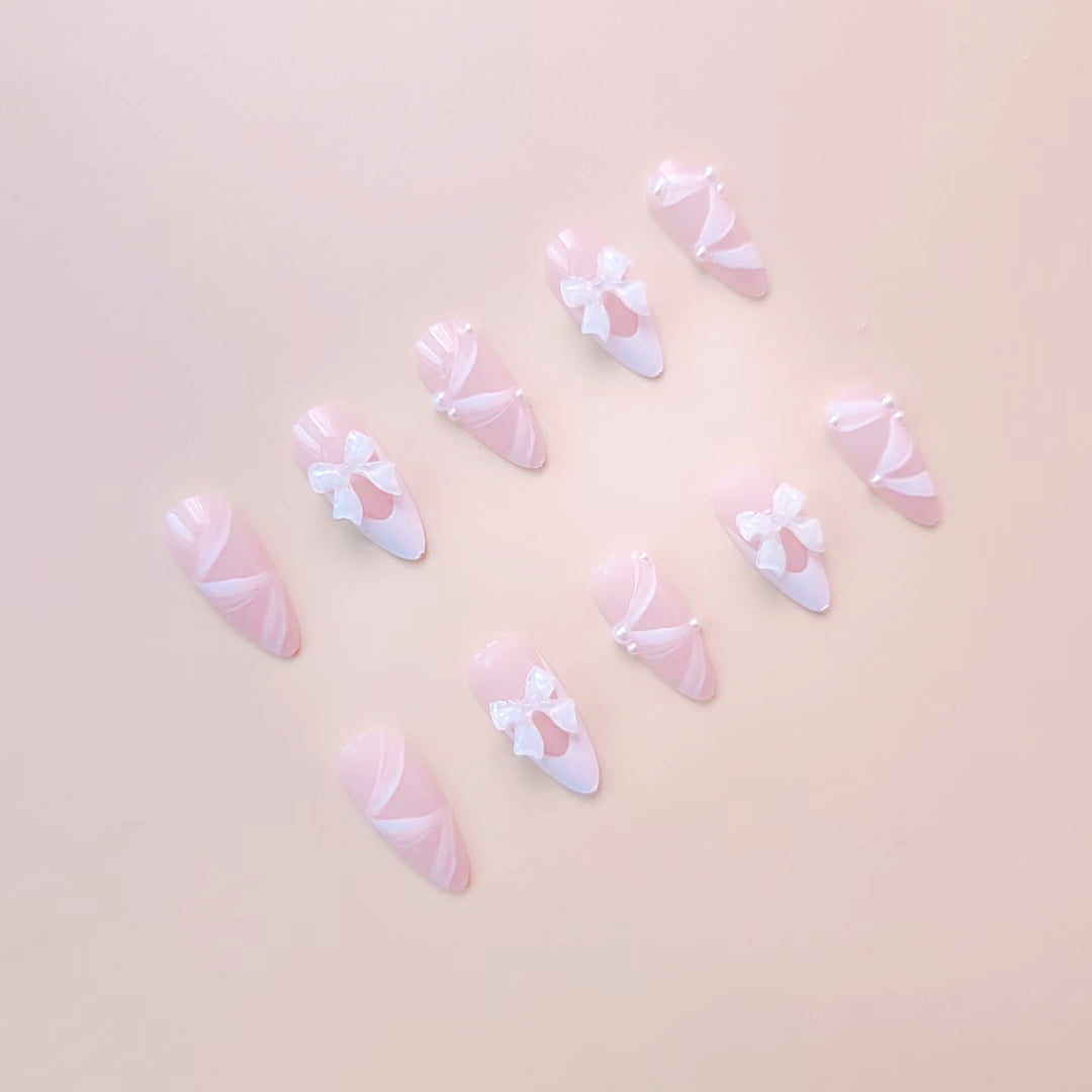Kunstnagelset mit eleganten 3D-Schleifen und Spitzenverzierungen Karnz