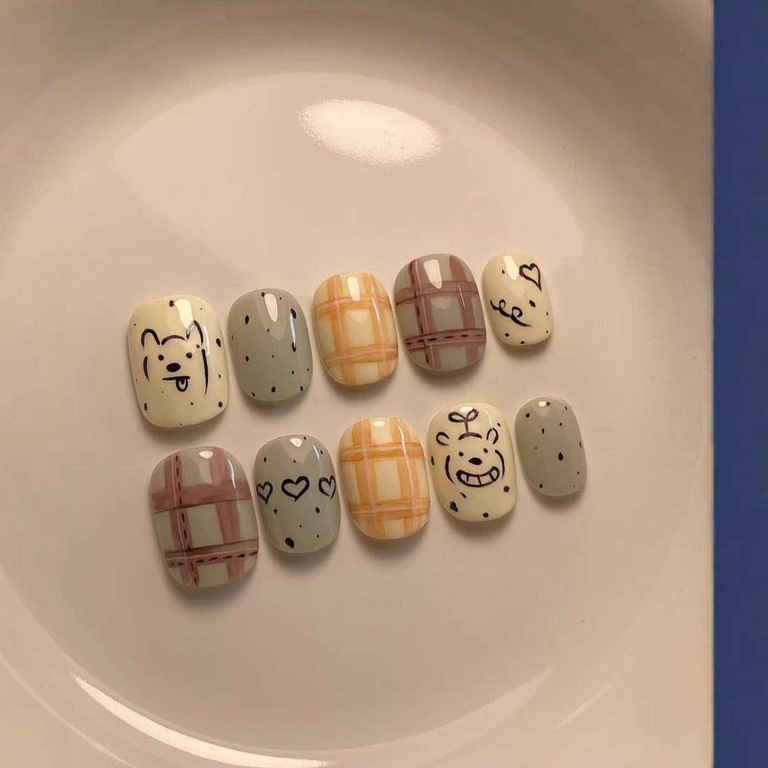 Verspieltes, charakterthemenhaftes Press-On-Nagelkunst-Set