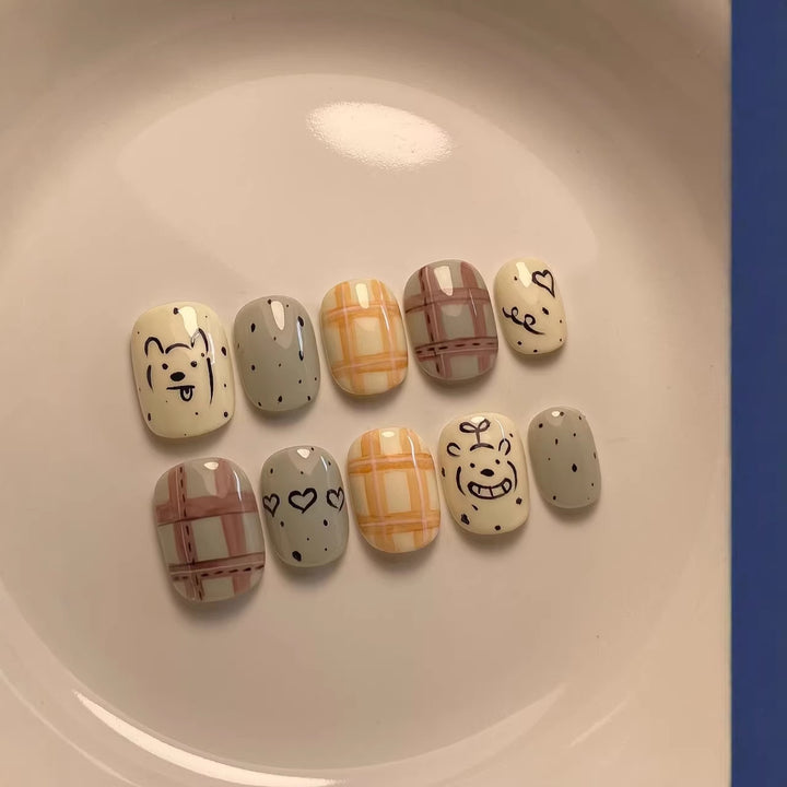 Verspieltes, charakterthemenhaftes Press-On-Nagelkunst-Set