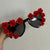 Damen Sonnenbrille mit floralen Details Karnz