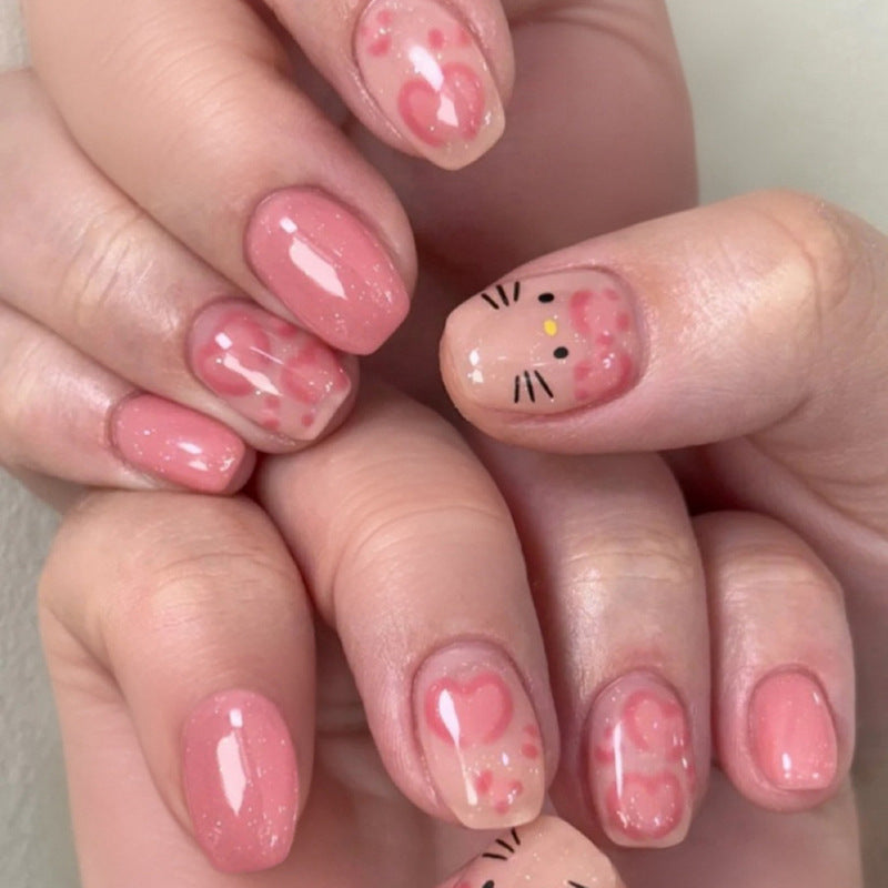 Künstliche Nagelkunst mit niedlichen Tier- und Herzmotiven Karnz