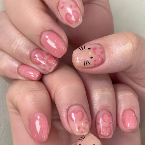 Künstliche Nagelkunst mit niedlichen Tier- und Herzmotiven Karnz