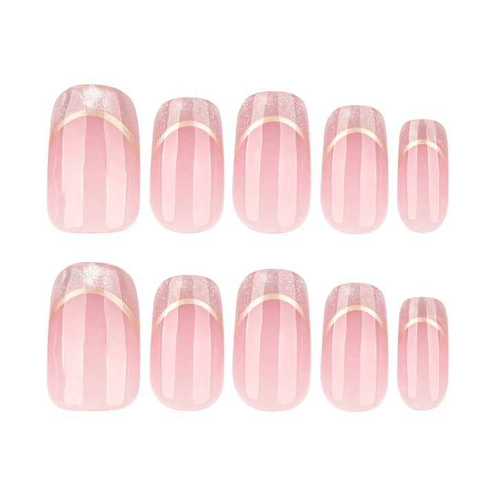 Kunstvolle Nagelverlängerungen mit Glitzer- und Golddetails Karnz