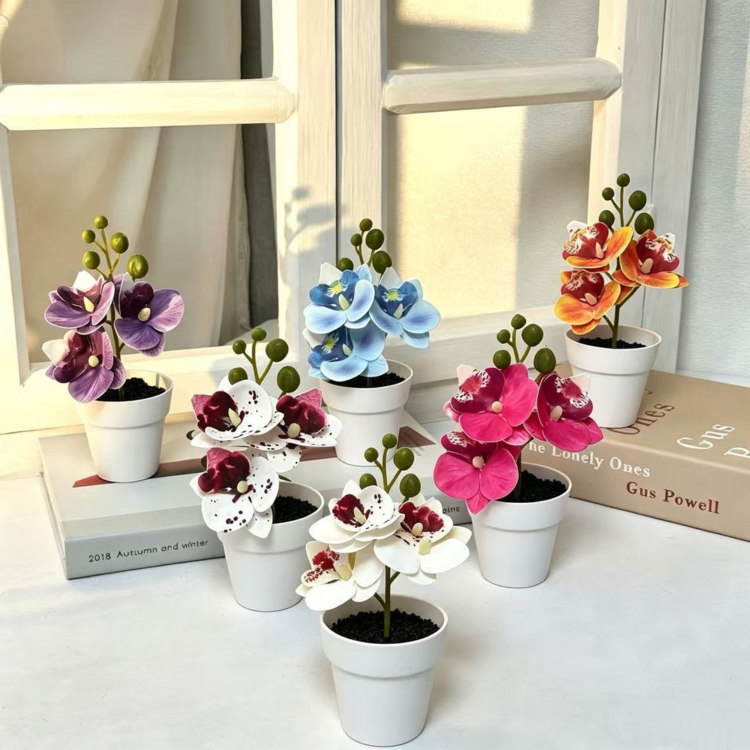 Lebensechte florale Orchideenarrangement für die Wohnkultur