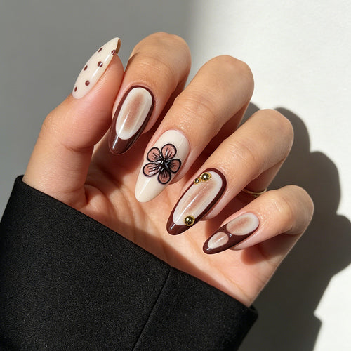 Künstlerisches Press-On-Nagelset mit floralen und geometrischen Designs Karnz