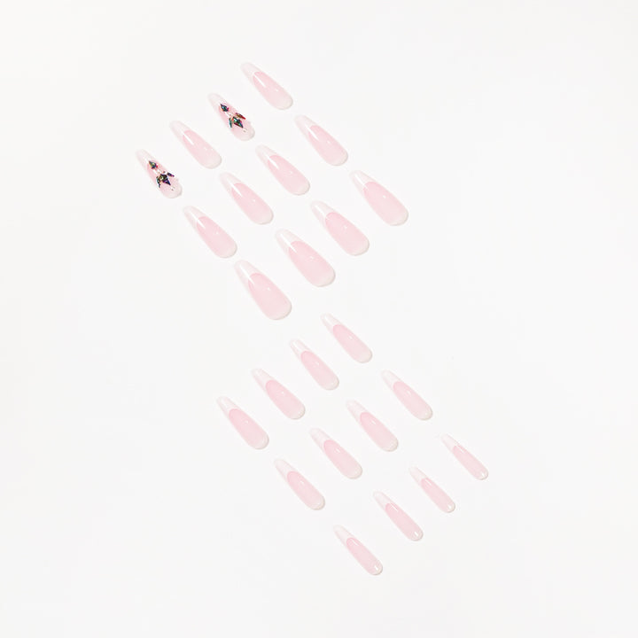 Premium Nagelverlängerungen mit eleganten Designs und Glitzerakzenten Karnz