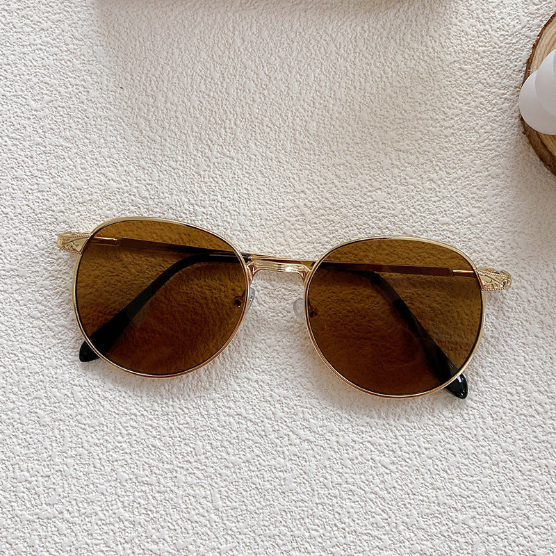 Modische Sonnenbrille mit Rundem Rahmen und Filigranem Design Karnz