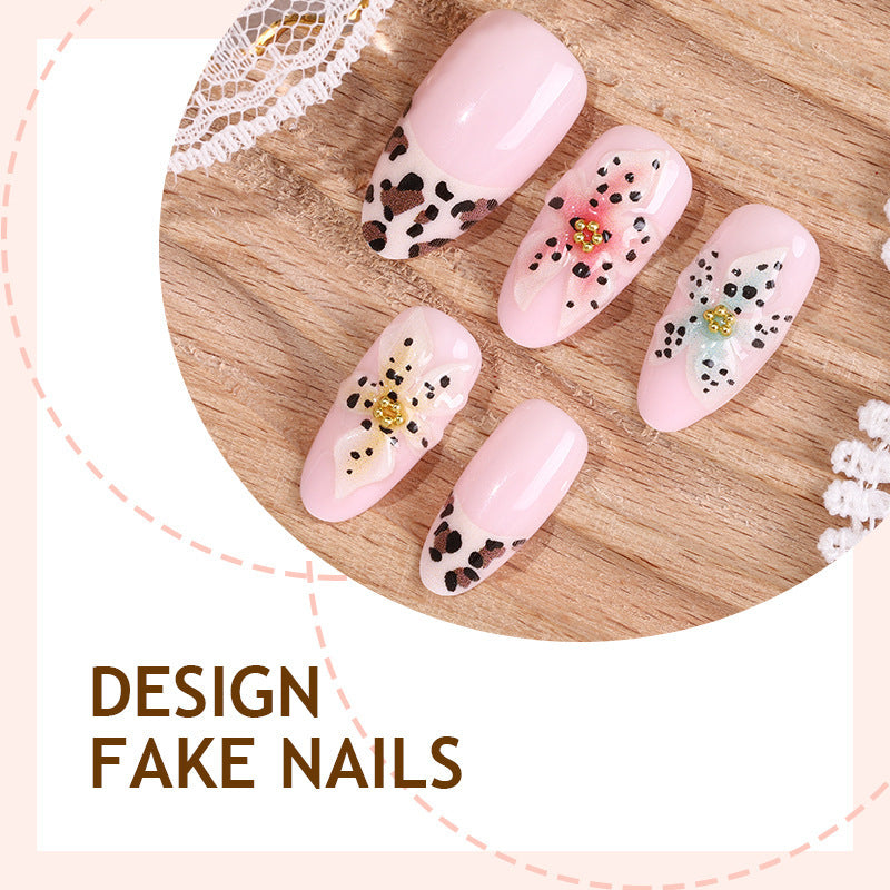 Kunstnagelset mit floralen und tierischen Motiven Karnz