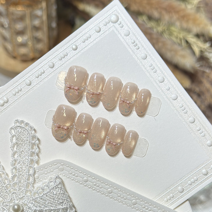 Press-On-Nagelkunst-Set mit eleganten Schleifenakzenten Karnz