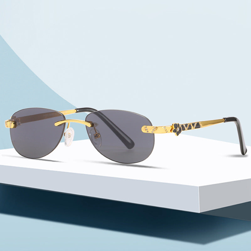 Damen modische Sonnenbrille mit stilvollem Metallrahmen und schützenden Gläsern Karnz