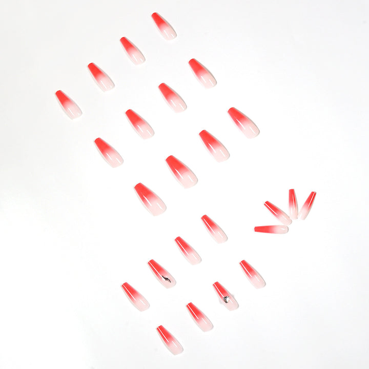 Kunstvolle Stiletto-Nägel mit elegantem Farbverlauf und Strassverzierung Karnz