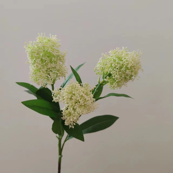Lebensechte Blumenstängelarrangement