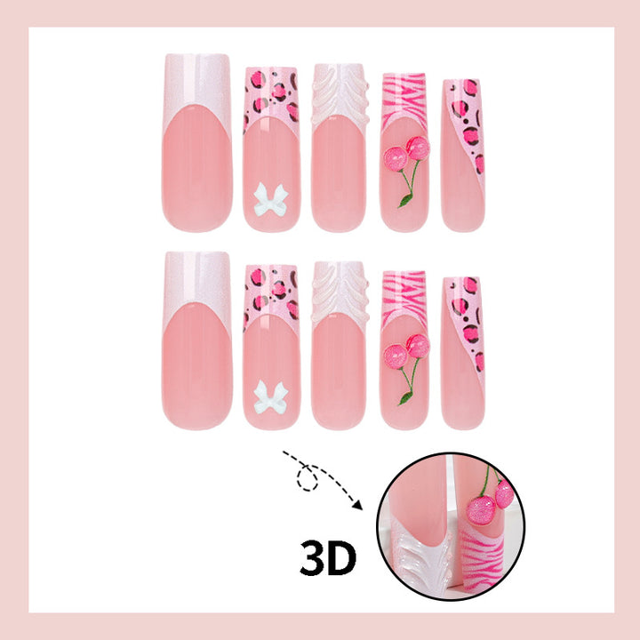 Kunstnagelset mit verspielten Motiven Karnz