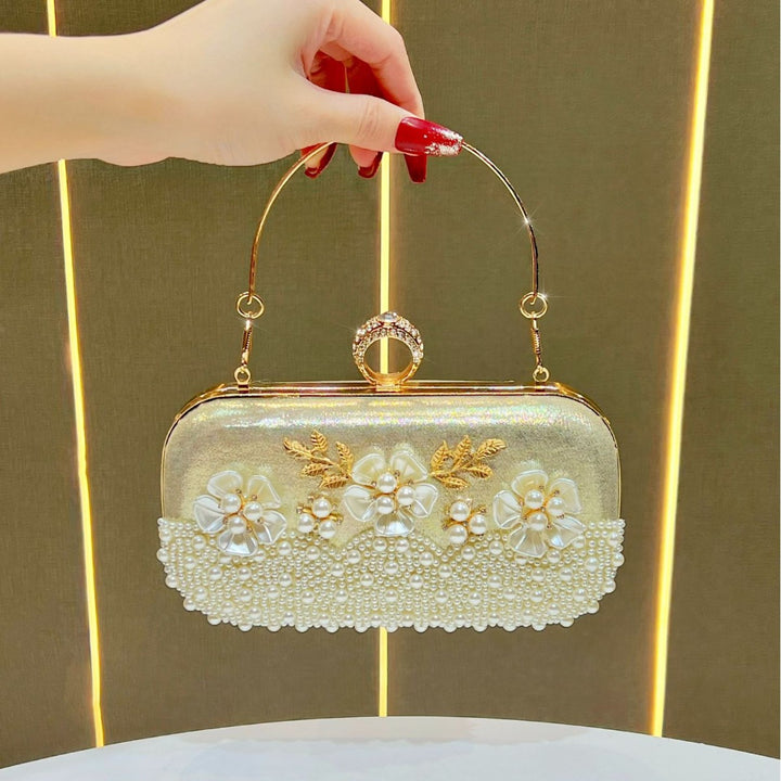 Elegante perlenverzierte Abendtasche