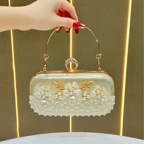 Elegante perlenverzierte Abendtasche