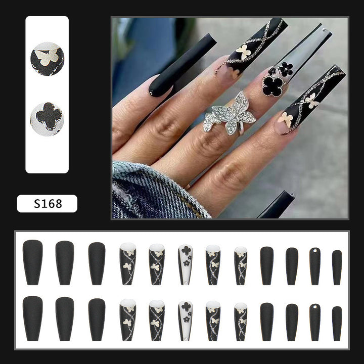 Kunstnagelset mit eleganten Schmetterlings- und Blumenmotiven Karnz