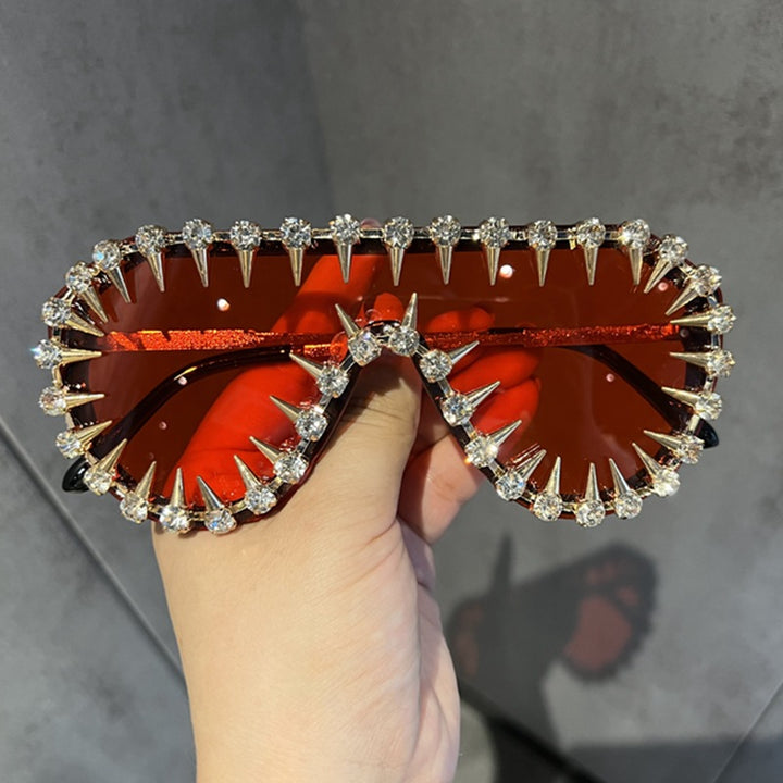 Damen extravagant gestaltete Cat-Eye-Sonnenbrille mit Glitzerakzenten Karnz