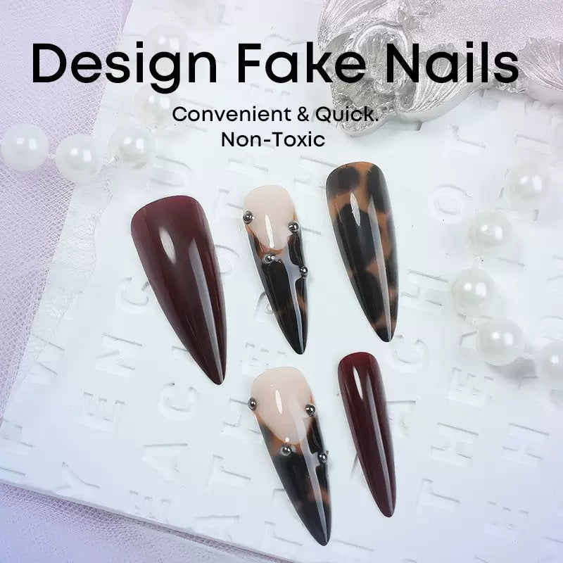 Kunstnagelset mit eleganten Spitzen und geschmackvollen Akzenten Karnz