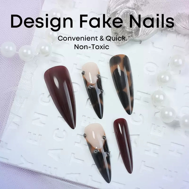 Kunstnagelset mit eleganten Spitzen und geschmackvollen Akzenten Karnz