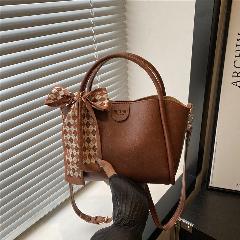 Elegante Schleifenakzent-Handtasche Karnz