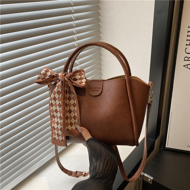 Elegante Schleifenakzent-Handtasche Karnz