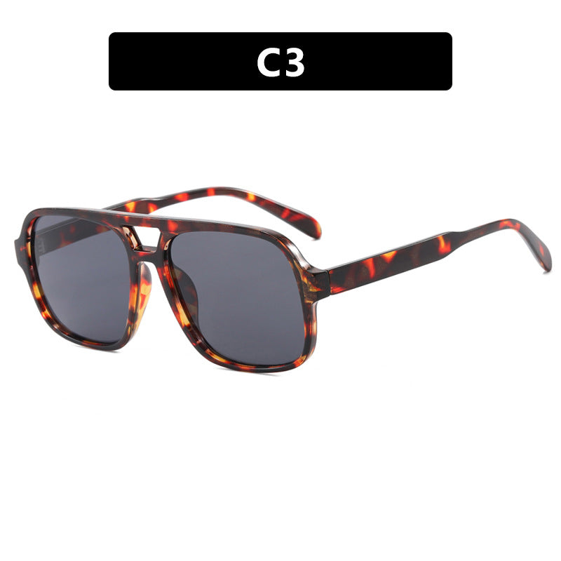 Damen moderne quadratische Sonnenbrille mit stylishem transparentem Rahmen Karnz