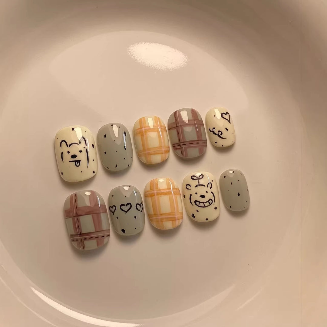 Verspieltes, charakterthemenhaftes Press-On-Nagelkunst-Set