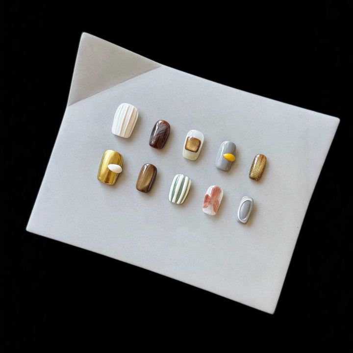 Künstlerisches Press-On-Nagelset mit einzigartigen strukturierten Designs