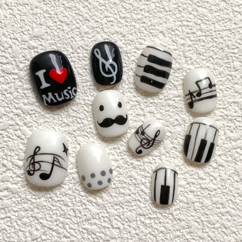 Themenhafte Press-On Nagelkunst Karnz