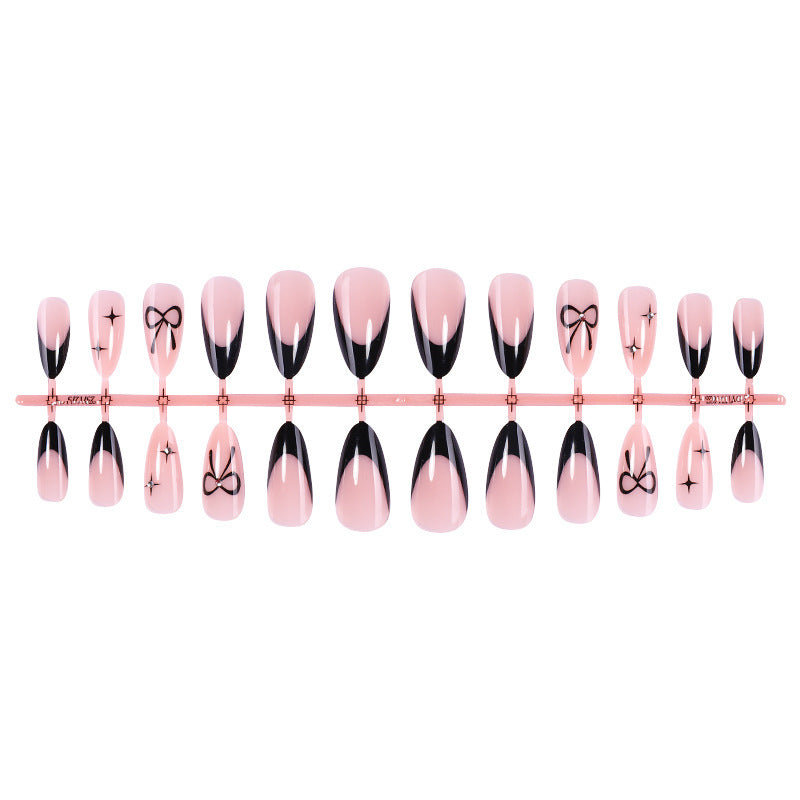 Kunstnagelset mit elegantem Ombre-Design und kreativem Schleifenmotiv Karnz
