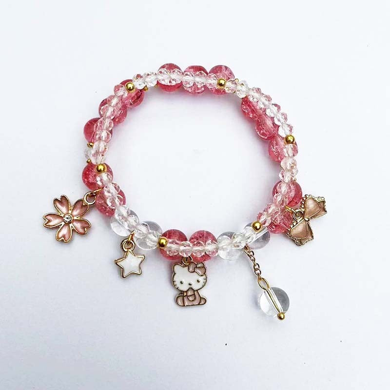 Elegantes Armband mit Tier- und Glitzeranhängern Karnz