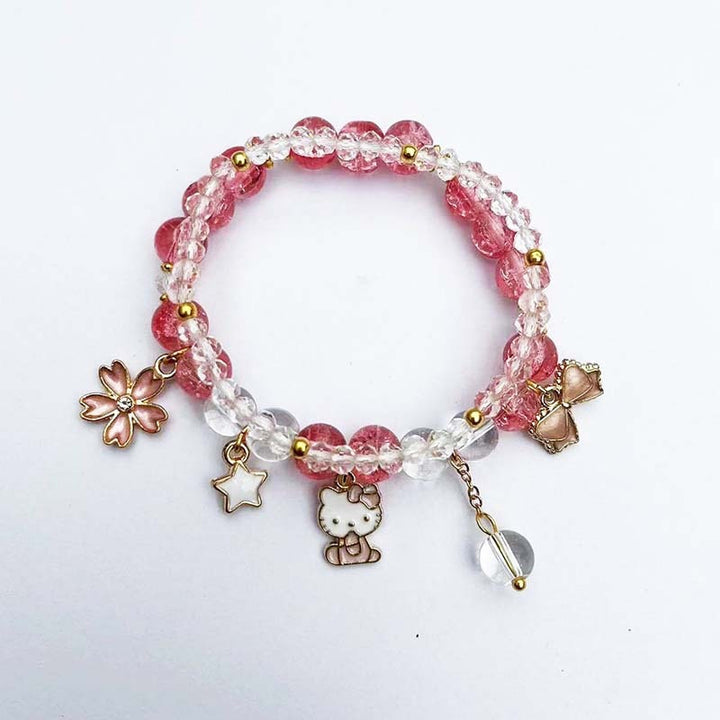 Elegantes Armband mit Tier- und Glitzeranhängern Karnz