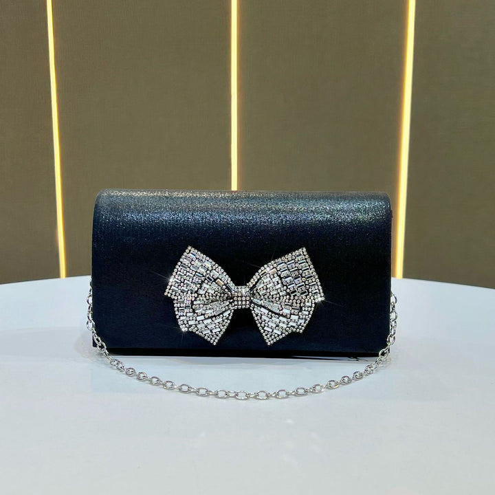 Bogen-verzierte Abendclutch