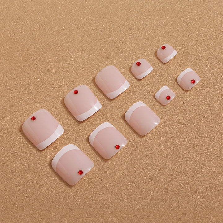 Fußnagelkunst mit kreativen geometrischen Designs und Glitzerakzenten Karnz