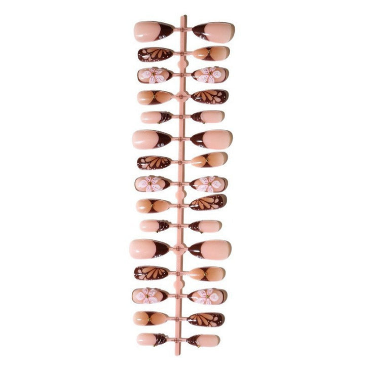 Kunstnagelset mit exquisiten floralen Motiven Karnz