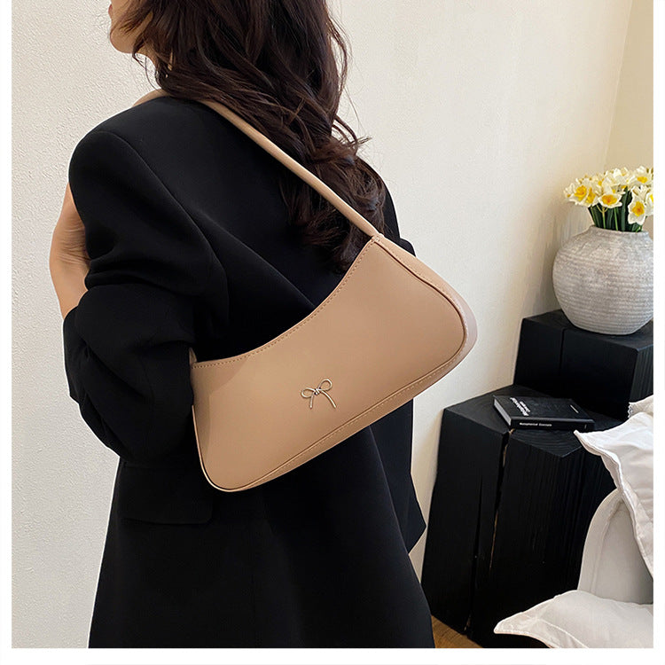 Elegante geschwungene Handtasche Karnz