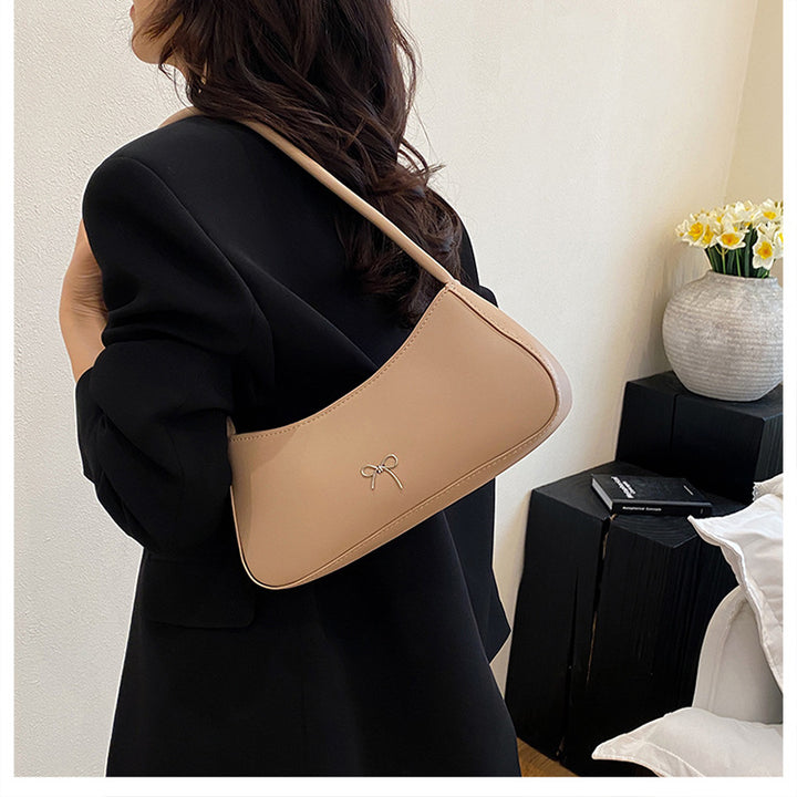Elegante geschwungene Handtasche Karnz