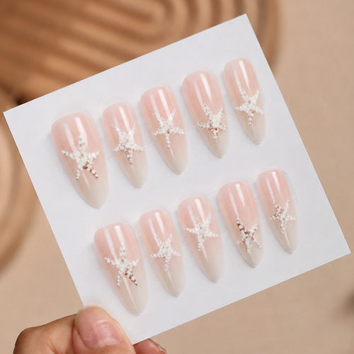 Kunstnagelset mit eleganten Stern-Motiven Karnz