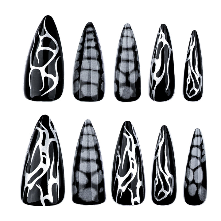 Kunstvolle Stiletto-Nägel mit modernem Strukturen-Design Karnz