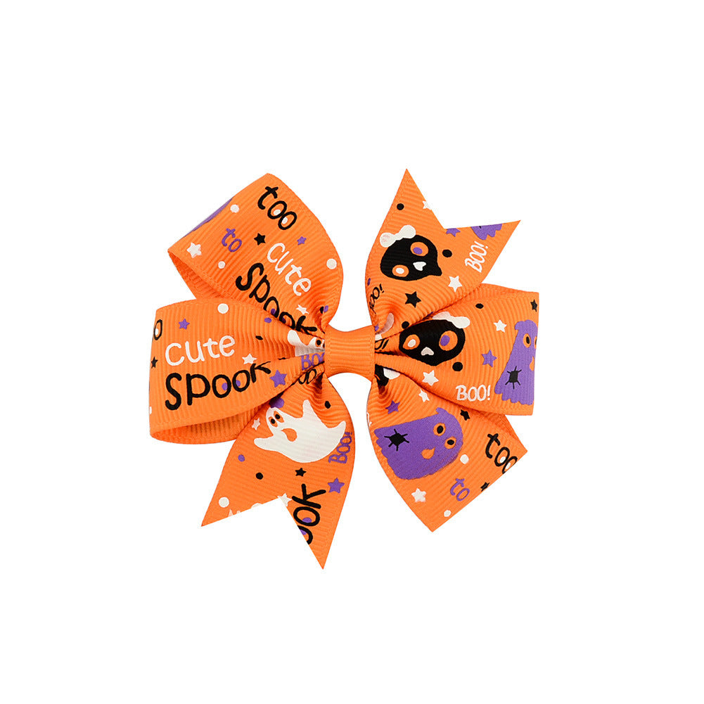 Halloween Schleife mit Kürbis- und Hexen-Motiven