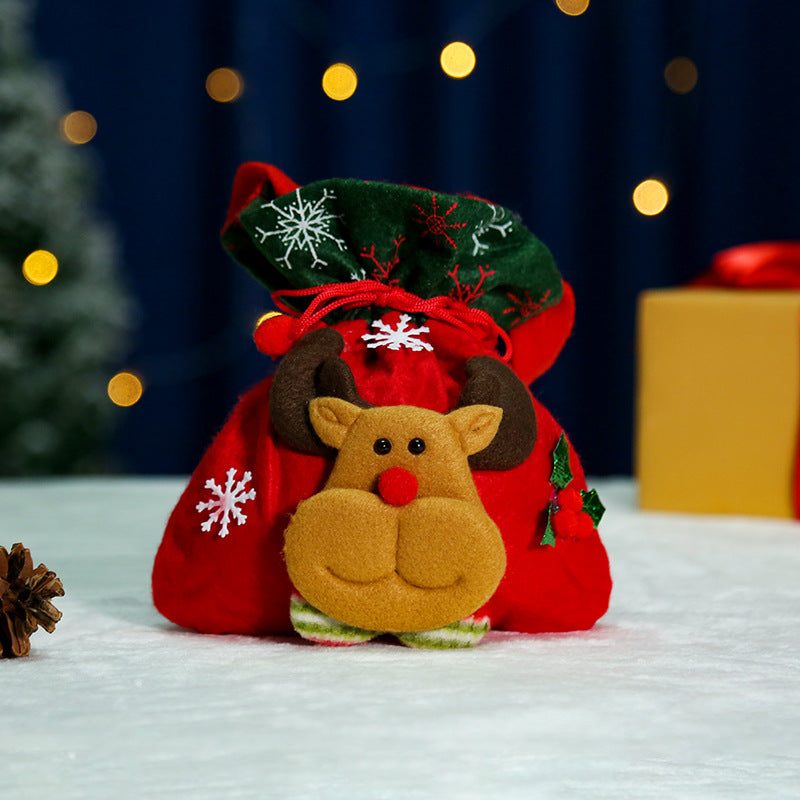 Niedlicher Weihnachtsgnom mit Geschenkesack Karnz