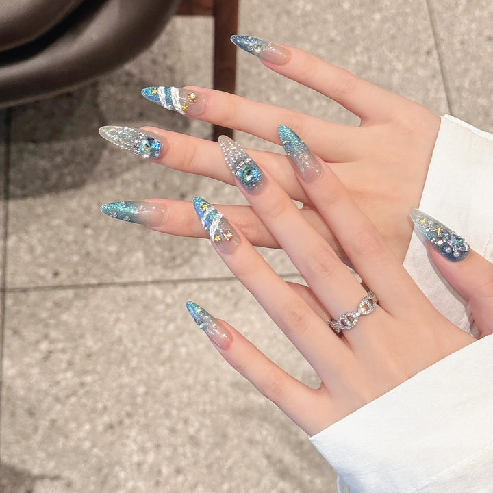 Elegante Stiletto Press-On Nagelset mit Glitzerakzenten