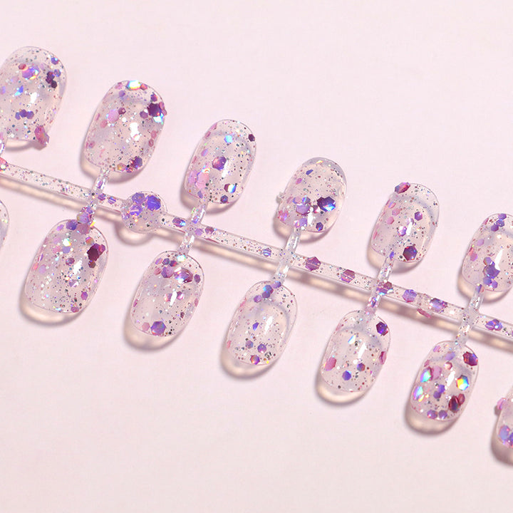 Glitzer-infused Press-On Nagelspitzen Karnz