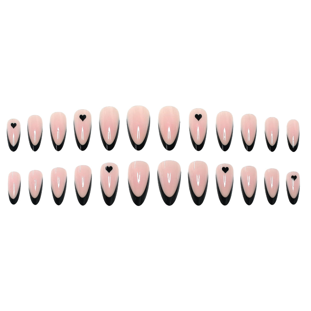 Elegante Stiletto Press-On Nagelspitzen mit Herz-Akzenten