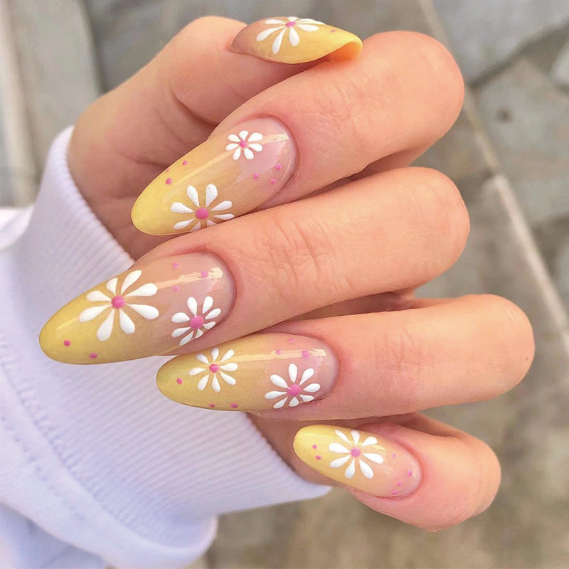 Kunstvolle Press-On Nägel mit floralen Mustern Karnz