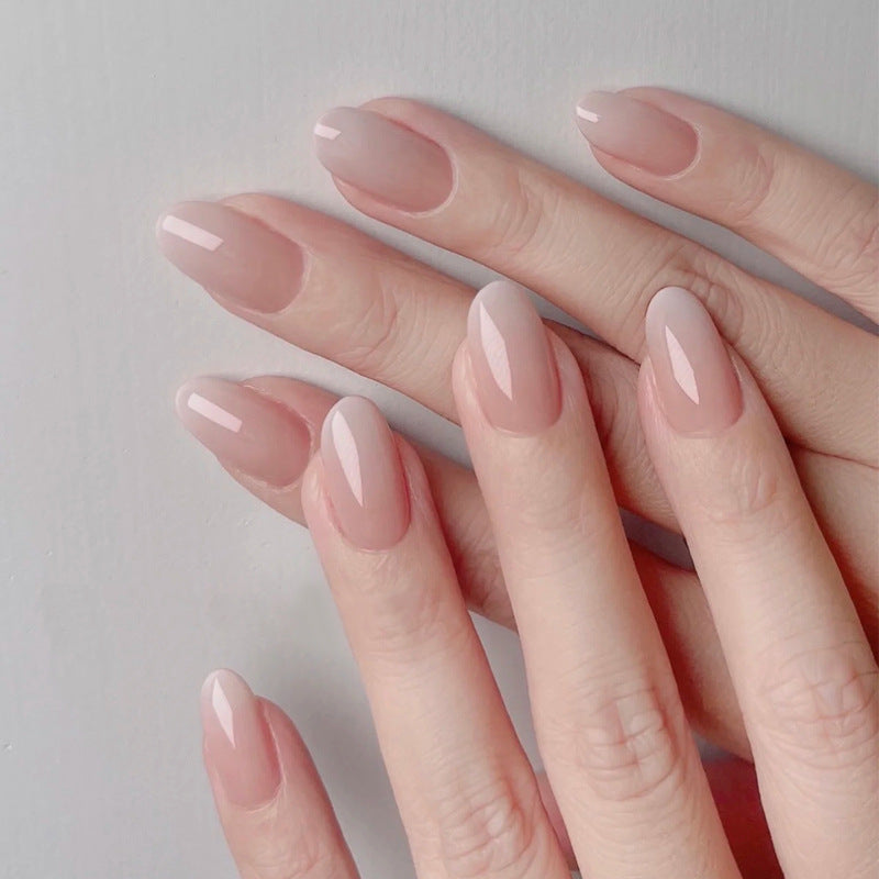 Elegantes Press-On-Nageldesign mit Strassakzenten Karnz