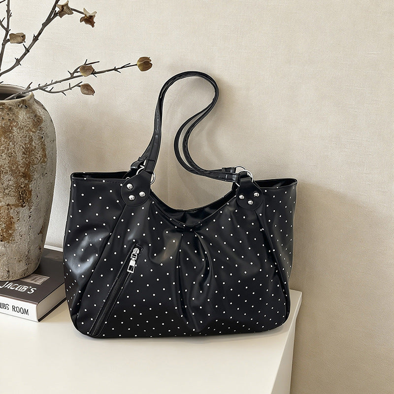 Stilvolle gepunktete Sling Bag