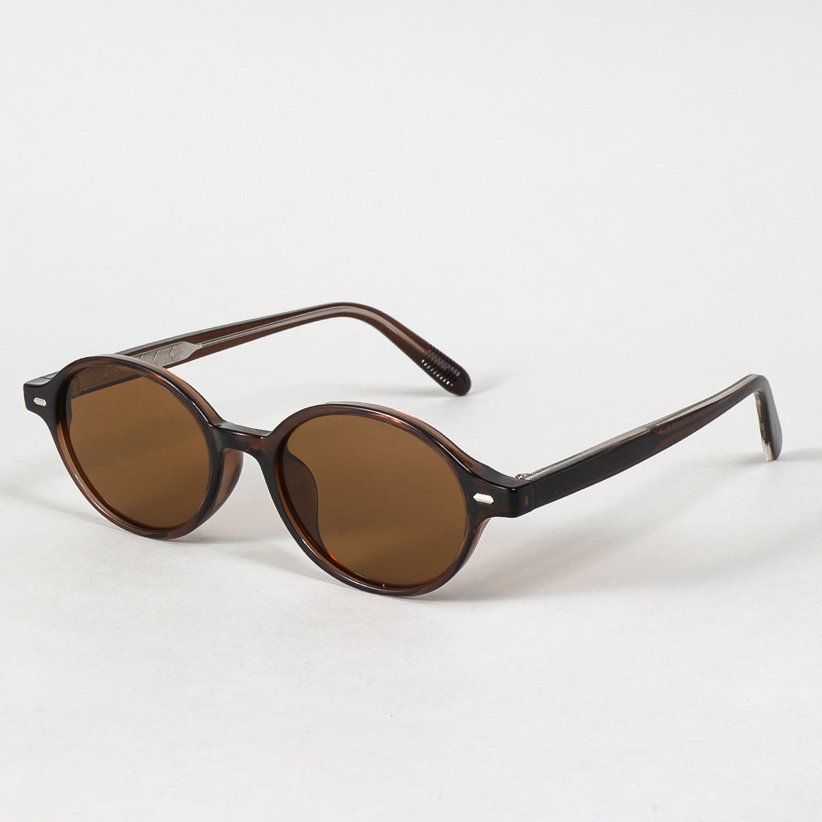 Damen modische Sonnenbrille im ovalen Design mit stylischen Akzenten Karnz